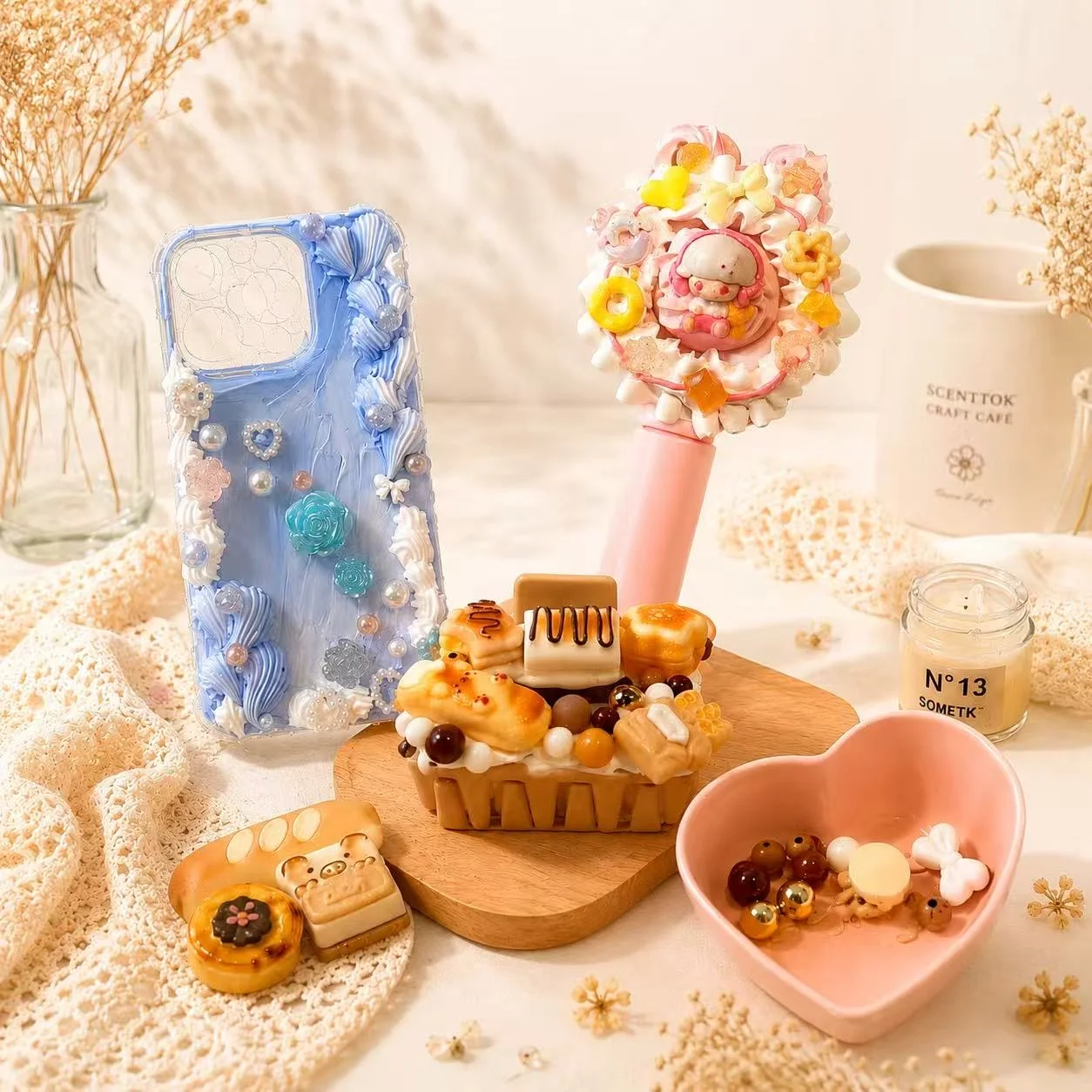 Decor cream glue DIY accessories with charms on phone case, hair clip, and brush