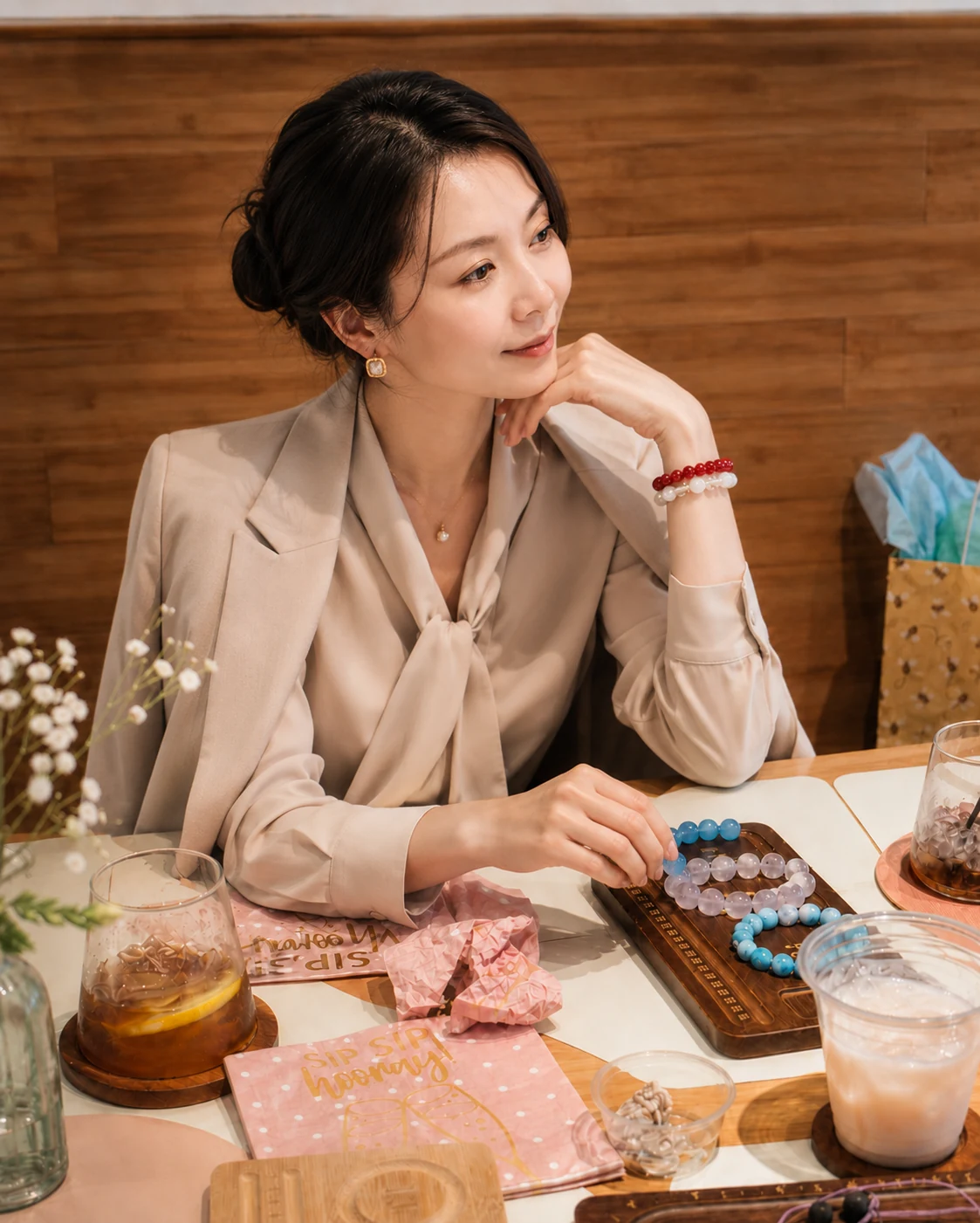 Guest wearing handmade bracelets at the table
